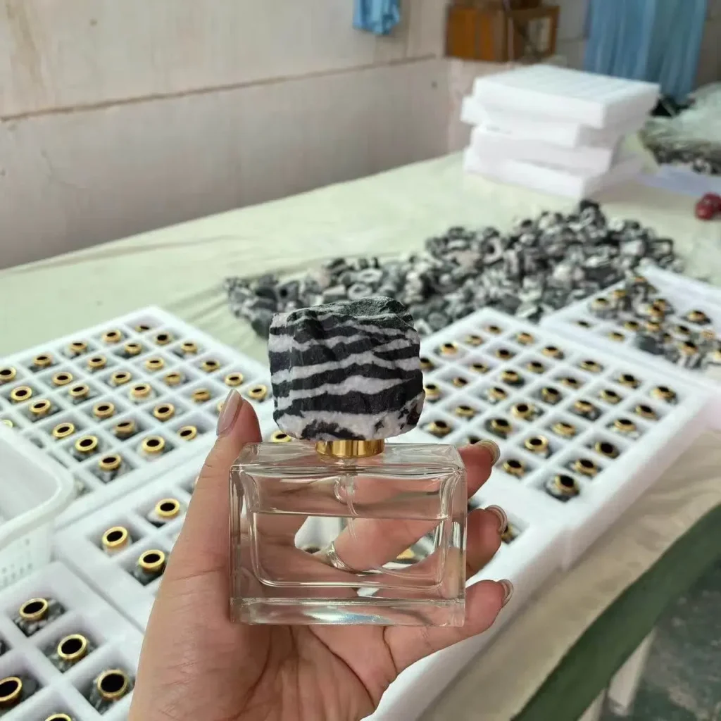 50ml luxu cylinder perfume bottle with magnetic Black and white zebra natural stone custom perfume cap magnetic attraction manufacturer